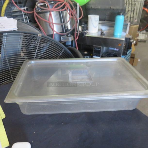 Full-size 4-inch deep food storage container with lid, transparent plastic, in good condition, suitable for restaurant use.