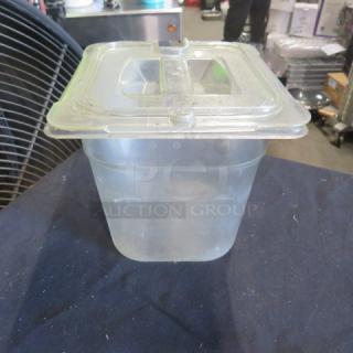 1/6 size, 6-inch deep food storage container with clear lid. Used condition. Ideal for kitchen organization. Brand: 2XBID.