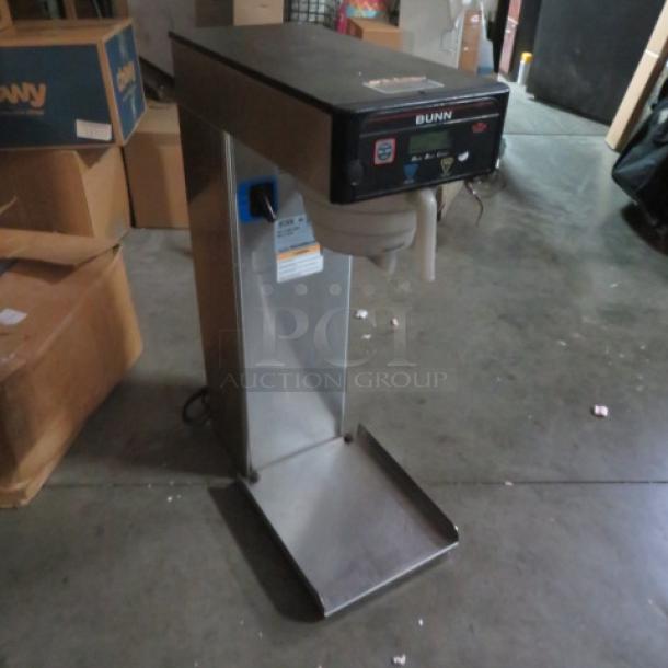 Bunn ITB tea brewer with filter basket, Model# ITB, 120V, stainless steel, 12x23x34 inches, good condition.