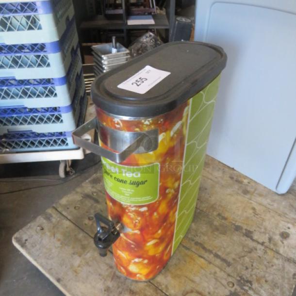 Slim Jim tea satellite dispenser with lid, sweet tea design, black spigot, metal handles, and condition label on top.