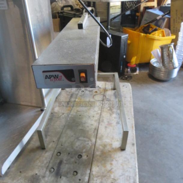 APW Wyott PD-1A food warmer, 120V, countertop model, features stainless steel construction. Visible on/off switch, APW Wyott logo.