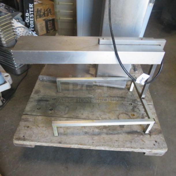 APW Wyott PD-1A food warmer, 120V, stainless steel, tabletop model, visible power cord, mounted on a wooden pallet.