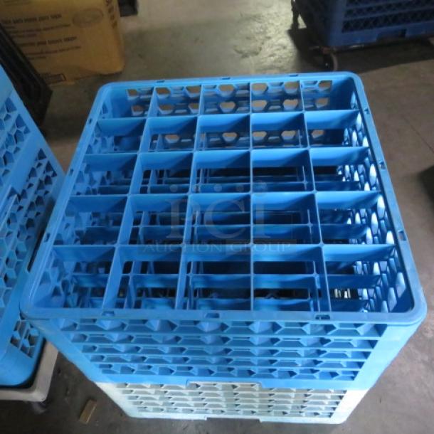 Blue 25 Hole Dishwasher Rack by 2XBID, used condition. Sturdy plastic design, stackable with visible grid-like structure.