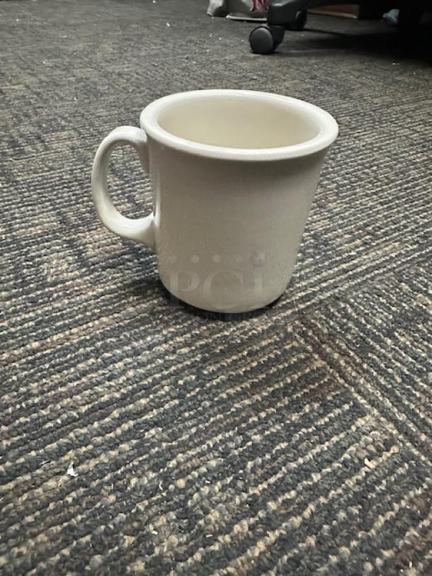 CAC Coffee Mug, model 10XBID. White, ceramic, sturdy handle. Appears in good condition, no visible markings or labels.