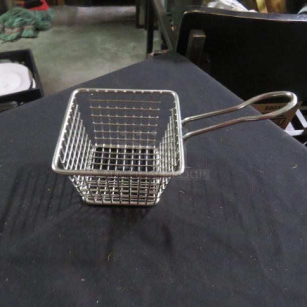 New stainless steel appetizer basket, 4x4x3 inches. Features a mesh design with a sturdy handle. Ideal for serving.