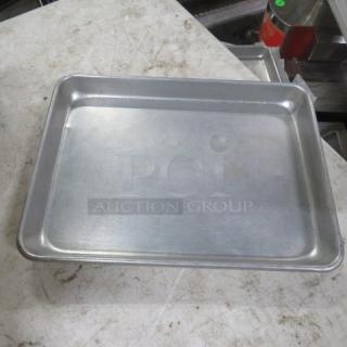 Metal sheet pan, 13x9.5 inches, used condition, minor scratches. Ideal for baking tasks, model 5XBID.