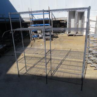 Black Metro shelf unit, 58x14x59 inches, metal construction, three tiers, durable condition, suitable for storage.