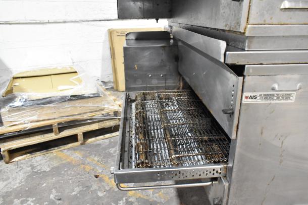 2 Middleby Marshall PS638G stainless steel conveyor pizza ovens on casters. Natural gas, 89,000 BTU, shows slight wear.