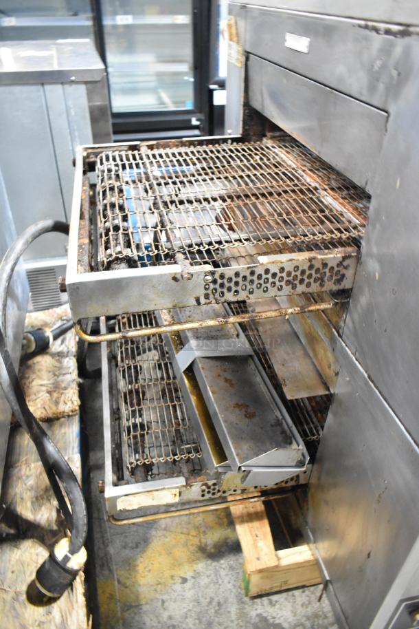 Middleby Marshall CTX DZ33I stainless steel conveyor pizza ovens, electric, on casters, showing trays and exterior condition.