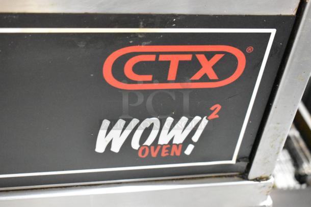 2 Middleby Marshall CTX DZ33I stainless steel conveyor pizza ovens, electric, 208V, on commercial casters, WOW! Oven logo.