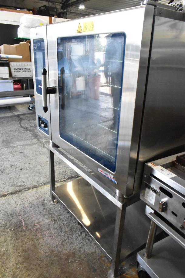 2018 Alto Shaam CTP7-20E stainless steel electric combi oven on equipment stand, 208-240V, 3 phase, excellent condition.