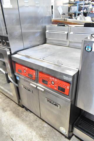 Vulcan 2TR45CF-1 Stainless Steel Commercial Floor Style Natural Gas Powered 2 Bay Deep Fat Fryer w/ Filtration System on Commercial Casters. 140,000 BTU. - Item #1215461