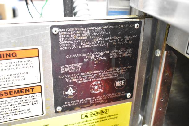 Metal label on Vulcan 2TR45CF-1 fryer, detailing model, BTU 140,000, clearance requirements, voltage, and NSF certification.