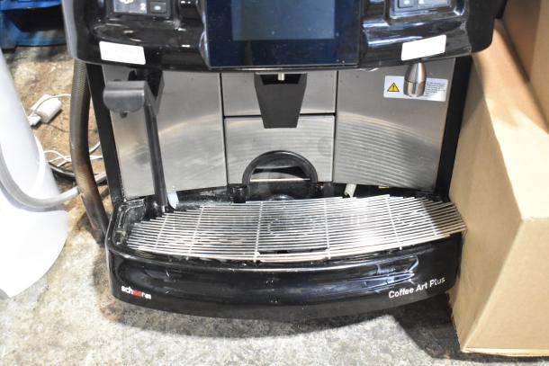 Schaerer Coffee Art Plus commercial espresso machine, automatic, black finish, metal drip tray, 120-208/240V, 1 phase.