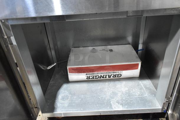 Hoshizaki DCM-751BAH stainless steel commercial ice maker with water and ice dispenser. Includes visible storage compartment.