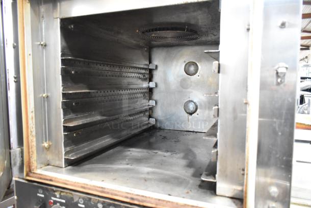 Nu Vu OP-4/8M stainless steel commercial oven proofer, 208V, 3 phase, on casters. Interior racks visible.