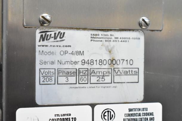 Nu Vu OP-4/8M stainless steel oven proofer, 208V, 3 phase, on commercial casters, visible model and serial number tags.