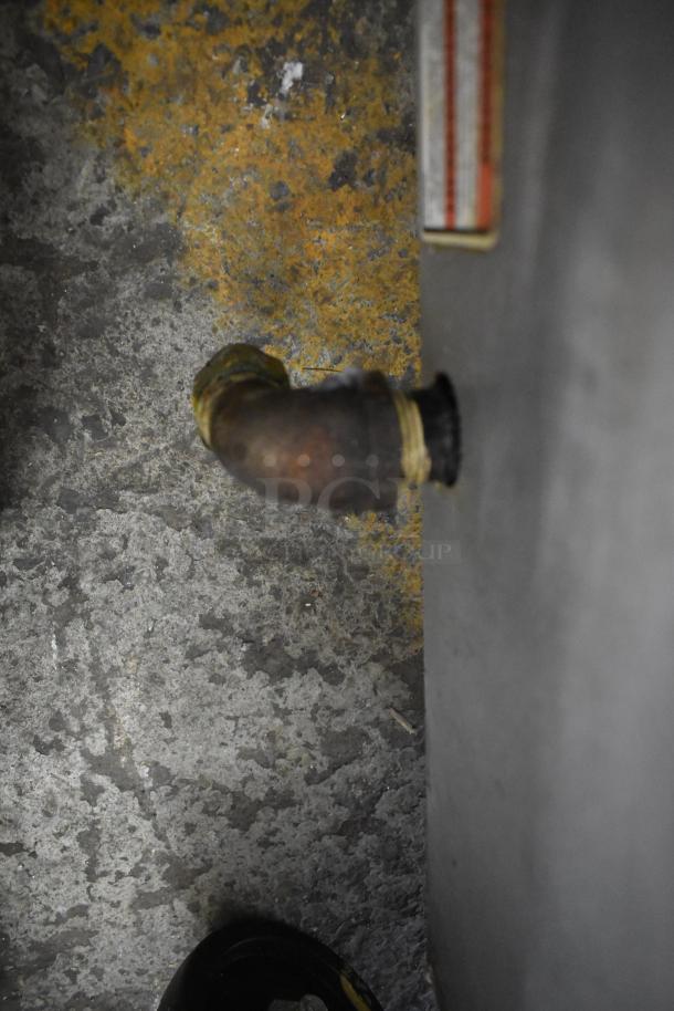 This image is related to the Vulcan VCRG36-T1 commercial griddle, but it shows a close-up view of a gas connection or pipe, not the griddle itself.