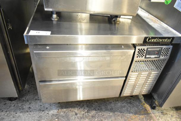 Continental stainless steel 2-drawer chef base, commercial casters, 115V, 1 phase, visible label "Continental".