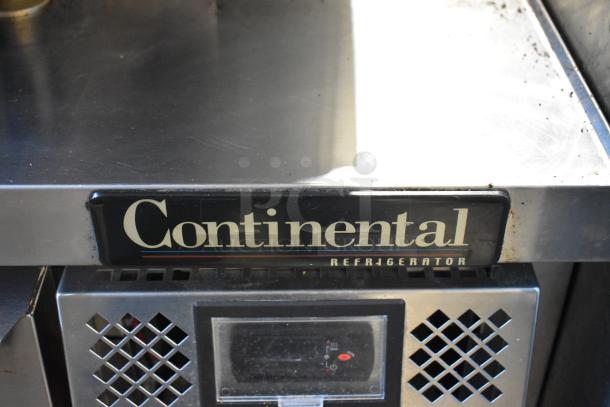 Continental stainless steel commercial chef base with 2 drawers on casters. Features 115 volts, 1 phase. Visible "Continental" branding.
