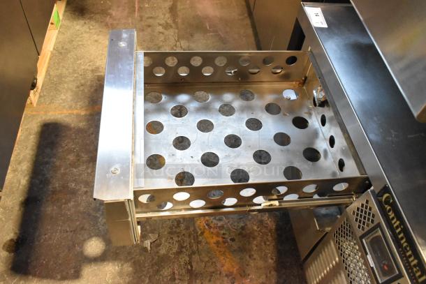 Continental stainless steel 2-drawer chef base on casters, 115V, single phase, perforated shelving, commercial-grade.