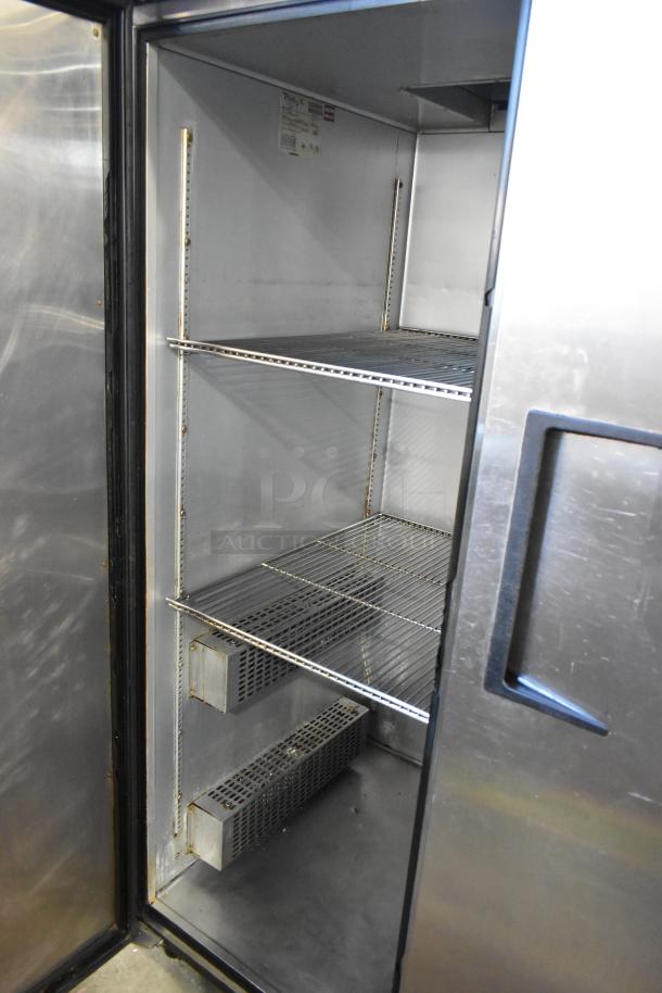 True TA2H-2S stainless steel 2-door commercial warming cabinet with racks, visible tags, 115/208-240 volts, 1 phase.