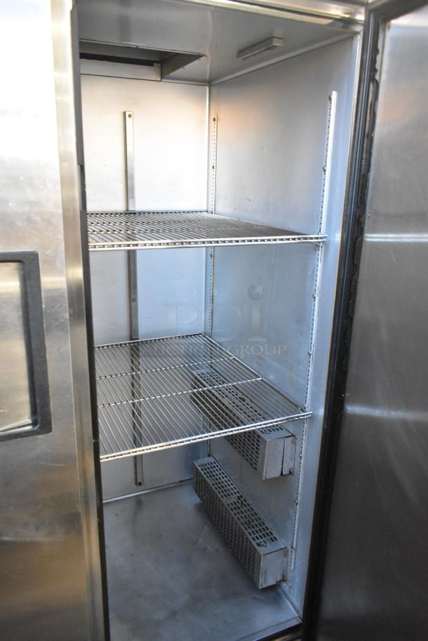 True TA2H-2S stainless steel 2-door reach-in warming cabinet, 3 racks, 115/208-240V, 1 phase, excellent condition.