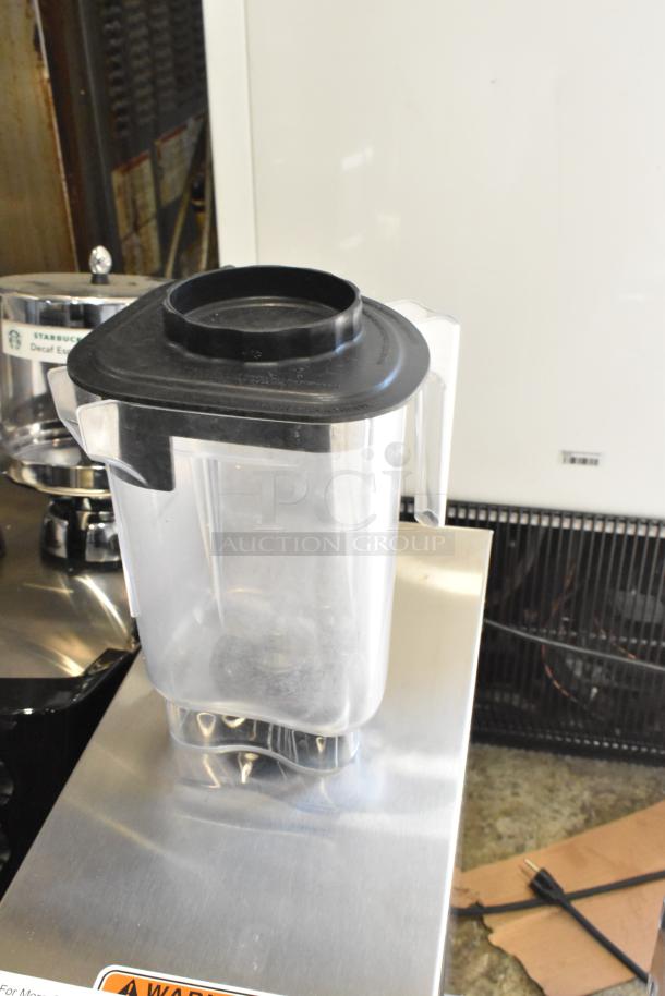 2022 Vita-Mix VM0145 commercial blender with sound enclosure, hinge lid, and two pitchers, shown on a countertop.