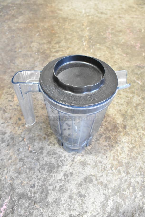 2021 Vita-Mix VM0145 blender pitcher, clear plastic with black lid, used condition.