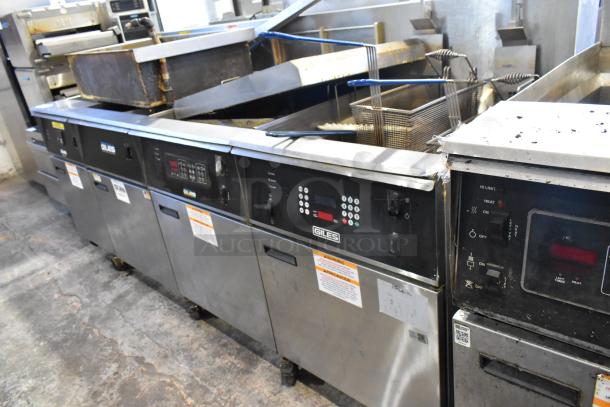 Giles EOF-24 commercial electric 3-bay deep fat fryer, stainless steel, with center dumping station, on casters, 480V, 3-phase.