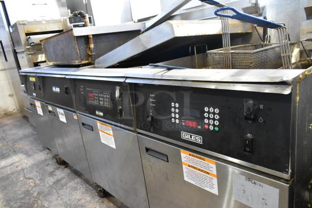 Giles EOF-24 stainless steel 3 bay deep fat fryer with center dumping station, digital controls, on casters. 480V, 3 phase.