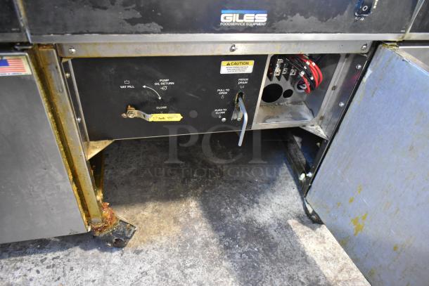 Giles EOF-24 stainless steel 3-bay electric deep fryer, center dumping station, 480V, 3-phase, on commercial casters.