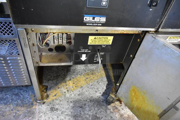 Giles EOF-24 stainless steel 3-bay electric fryer with center dumping, on casters, 480V 3-phase, used, visible wear.