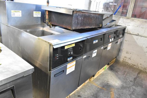 Giles EOF-24 stainless steel electric 3-bay deep fryer with center dumping station, on commercial casters. 480V, 3 Phase.