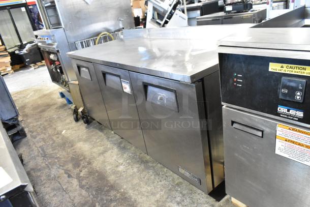 True TWT-72 stainless steel 3-door worktop cooler on casters, 115V, 1 Phase, clean exterior, commercial use.