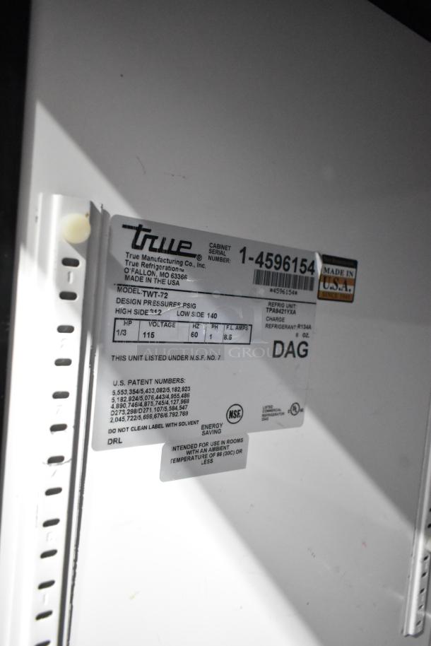 True TWT-72 commercial 3-door worktop cooler, stainless steel, NSF certified, 115V, on casters, label shown.