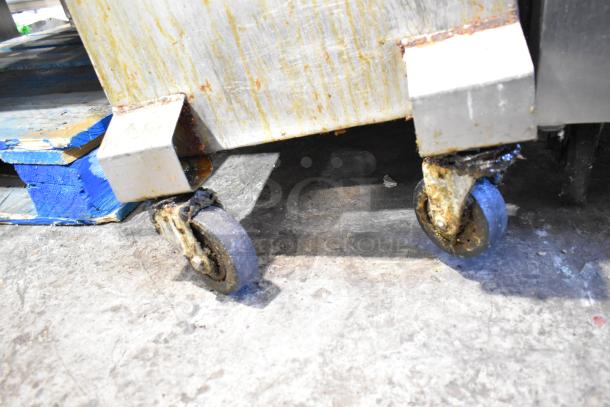 402 Metal Commercial Fryer Oil Filter on casters, showing rust and wear. Model 402, 120 volts, 1 phase.