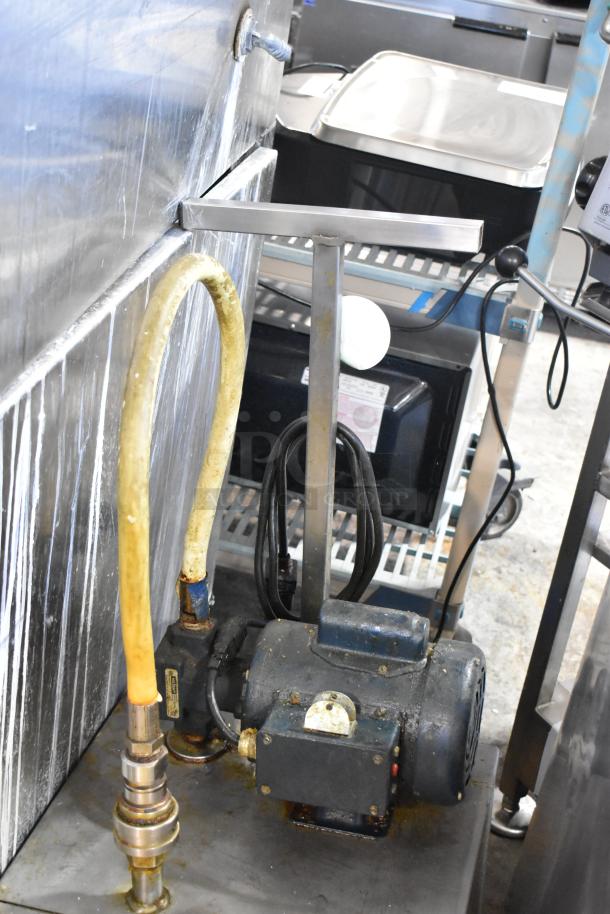 Commercial portable filter for fryer oil, model 402, 120 volts, 1 phase. Includes hose, motor unit in used condition.