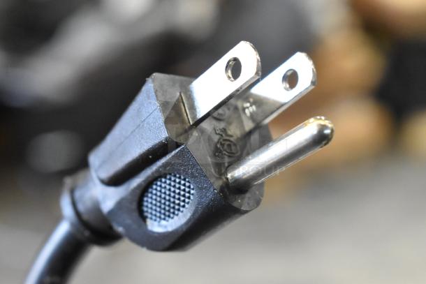Close-up of a power plug suitable for the Bizerba SE12DUS meat slicer, showing standard 120V, 1-phase design.