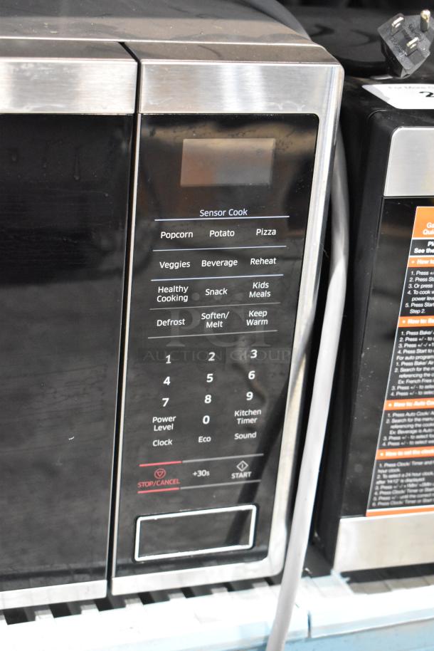 2018 Samsung MS14K6000AS countertop microwave, keypad with cooking presets, includes plate, 120V, 1 phase.