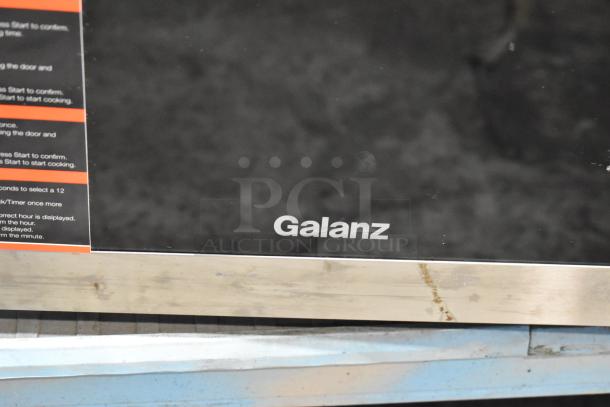 2020 Galanz GSWWD09S1A09A Countertop Microwave Oven, in decent condition, with visible Galanz logo and control panel details.