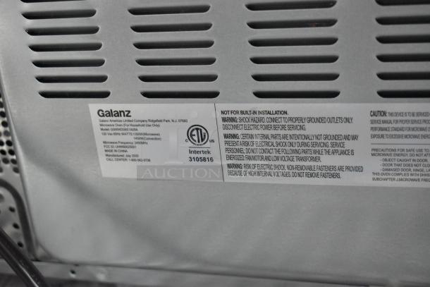 2020 Galanz GSWWD09S1A09A microwave oven label showing model, 120V power, ETL certification, and July 2020 manufacture date.