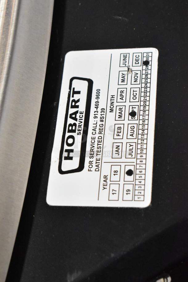 2020 Hobart HTi-7LH4W metal countertop scale with label for service call info and test date. 120/208-240V, 1 Phase.