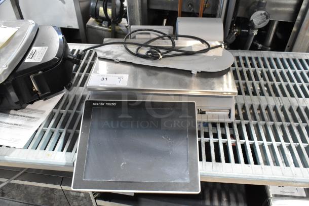 Mettler Toledo UCCW metal commercial countertop scale with touchscreen, 120/240 volts, 1 phase, tested and working.