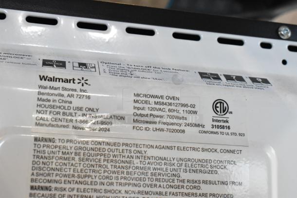 2024 Mainstays metal countertop microwave, model MS8436127995-02. 120V, 60Hz, 1100W. Household use only, made in China.