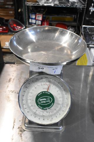 Yamaha SM(N) metal countertop food portioning scale, used condition, round dial, stainless steel bowl, "Made in Japan" label visible.