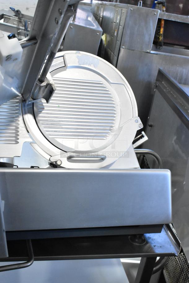 2016 Bizerba GSP HD meat slicer on stainless steel stand, 120V, 1 phase, excellent condition, commercial use.