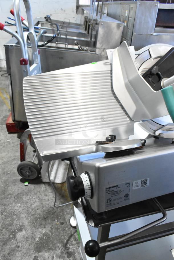 2016 Bizerba GSP HD meat slicer on stainless stand, commercial-grade, 120V, excellent condition, clear labels visible.