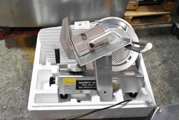 Bizerba Metal Commercial Countertop Meat Slicer, 120 Volts, 1 Phase, in packaging. Features safety and operation labels.