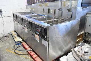 Giles EOF-24 Stainless Steel Commercial Electric Powered 3 Bay Deep Fat Fryer w/ Center Dumping Station on Commercial Casters. 480 Volts, 3 Phase. - Item #1215495